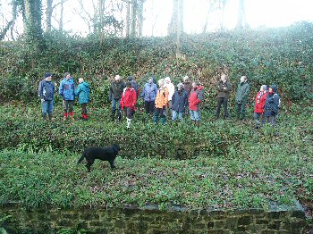 Walkers inspecting boat bays at foot of Hobbacott incline plane