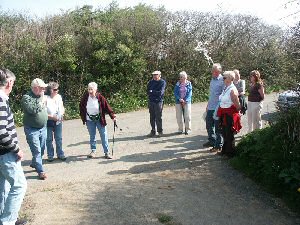 Audrey Wheatley welcoming walkers at the start of the Hot Cross Bun Walk on 14th April.  Photo: Mike Moore