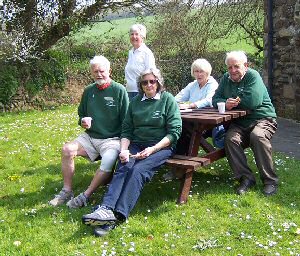 Members waiting for the arrival of walkers outside the Barge Workshop. Photo: Betty Moore