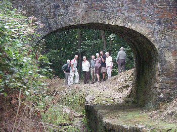 Walkers inspecting the retored bridge