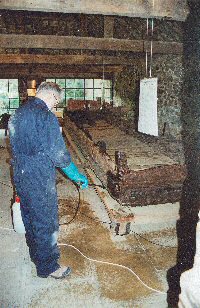 Tub Boat being sprayed in Barge workshop