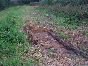 Canal work boat on the feeder arm